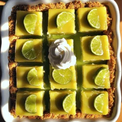 - 1 ½ Tassen Graham-Cracker-Brösel - ½ Tasse ungesalzene Butter, geschmolzen - ⅓ Tasse Kristallzucker Ich beginne mit den Hauptzutaten. Die Graham-Cracker-Brösel geben der Kruste einen knusprigen Biss. Durch das Mischen mit geschmolzener Butter wird die Kruste lecker und fest. Kristallzucker sorgt dafür, dass alles süß und harmonisch schmeckt. - 2 große Eier - 1 Tasse gesüßte Kondensmilch - ½ Tasse frisch gepresster Key-Limettensaft - Schale von 2 Key-Limetten Die Füllung macht die Bars frisch und cremig. Die Eier binden die Mischung. Gesüßte Kondensmilch bringt den süßen Geschmack. Key-Limettensaft und die Schale geben das besondere Aroma. Sie machen die Bars lebendig und köstlich. - Schlagsahne - Limettenscheiben Für die Garnierung nutze ich gern Schlagsahne. Sie bringt eine schöne Cremigkeit. Limettenscheiben sind ein toller Hingucker. Sie verleihen den Bars einen frischen Look und zusätzlichen Geschmack. Wenn du die volle Frische willst, sind diese Garnierungen perfekt. Für die genauen Mengen und die Zubereitung schau dir das vollständige Rezept an. Zuerst heizen Sie Ihren Ofen auf 175°C (350°F) vor. Dies sorgt dafür, dass die Kruste gleichmäßig backt. Bereiten Sie dann eine 20x20 cm (8x8 Zoll) Backform vor. Fetten Sie die Form gut ein, damit die Riegel später leicht herauskommen. Für die Kruste vermischen Sie 1 ½ Tassen Graham-Cracker-Brösel mit ½ Tasse geschmolzener Butter und ⅓ Tasse Kristallzucker. Rühren Sie die Mischung, bis alles gut vermengt ist. Die Mischung sollte feucht und sandig aussehen. Übertragen Sie die Krustenmischung in die vorbereitete Backform. Drücken Sie die Mischung gleichmäßig auf den Boden der Form. Das sorgt für eine feste und knusprige Basis. Jetzt machen wir die Füllung. Nehmen Sie eine mittlere Schüssel und vermischen Sie 2 große Eier, 1 Tasse gesüßte Kondensmilch, ½ Tasse frisch gepressten Key-Limettensaft, die Schale von 2 Key-Limetten und ¼ Teelöffel Salz. Schlagen Sie alles gut zusammen, bis die Mischung glatt ist. Gießen Sie die Füllung vorsichtig über die abgekühlte Kruste. Verteilen Sie sie gleichmäßig, damit jeder Bissen lecker ist. Für die gesamte Zubereitung können Sie das detaillierte Rezept in der [Full Recipe] nachlesen. Um die Kruste richtig zu drücken, ist es wichtig, eine gleichmäßige Schicht zu bilden. Verwenden Sie den Boden eines Glases oder eine kleine Schüssel, um die Mischung in die Form zu drücken. Drücken Sie fest, damit die Kruste nicht bröckelt. Um brüchige Ränder zu vermeiden, verwenden Sie genug geschmolzene Butter. Diese sorgt für die nötige Bindung. Achten Sie darauf, die Kruste vor dem Backen gut zu backen. So wird sie fest und knusprig. Überprüfen Sie die Konsistenz der Füllung, indem Sie sie gut verquirlen. Sie sollte glatt und cremig sein. Klumpen können die Textur stören. Um das Wackeln zu testen, nehmen Sie die Form vorsichtig aus dem Ofen. Die Füllung sollte in der Mitte leicht wackeln. Das zeigt, dass sie noch cremig bleibt, wenn sie abkühlt. Garnieren Sie die Riegel optimal mit Schlagsahne. Ein Klecks obenauf macht sie lecker und schön. Fügen Sie einige Limettenscheiben hinzu, um Farbe und Geschmack zu steigern. Bewahren Sie die Riegel in einer luftdichten Box auf. So bleiben sie frisch und schmackhaft. Stellen Sie sicher, dass sie gut gekühlt sind, bevor Sie sie servieren. {{image_4}} Du kannst die Füllung für deine Key Lime Pie Bars variieren. Eine tolle Idee ist die Verwendung anderer Zitrusfrüchte. Probiere zum Beispiel Zitronen oder Orangen. Diese Früchte geben einen neuen Geschmack, der frisch und lecker ist. Du kannst auch aromatisierte Extrakte hinzufügen. Ein paar Tropfen Vanille oder Mandelessenz können die Füllung bereichern. Diese kleinen Änderungen machen viel aus! Falls du eine glutenfreie Option möchtest, kannst du die Graham-Cracker-Brösel ersetzen. Verwende einfach glutenfreie Kekse oder Haferflocken. Mahle sie gut und mische sie mit Butter und Zucker. So bleibt die Kruste knusprig und lecker, ohne Gluten. Diese Anpassung macht das Rezept für alle zugänglich. Für eine vegane Version brauchst du Eiersubstitute und pflanzliche Kondensmilch. Du kannst zum Beispiel Leinsamen oder Chiasamen verwenden. Mische 1 Esslöffel Leinsamen mit 3 Esslöffeln Wasser. Lass es etwa 5 Minuten stehen, bis es dick wird. Verwende dann pflanzliche Kondensmilch anstelle der normalen. So bleiben die Bars cremig und lecker, ohne tierische Produkte. Für das vollständige Rezept, schau dir die [Full Recipe] an. Key Lime Pie Bars halten sich im Kühlschrank bis zu einer Woche. Legen Sie die Riegel in einen luftdichten Behälter. Stellen Sie sicher, dass sie nicht direkt mit Luft in Kontakt kommen. So bleibt die Frische erhalten. Um die Riegel einzufrieren, schneiden Sie sie zuerst in Portionen. Wickeln Sie jede Portion in Frischhaltefolie ein. Legen Sie die eingewickelten Riegel in einen gefrierfesten Beutel. Zum Auftauen legen Sie die Riegel einfach in den Kühlschrank. Lassen Sie sie overnight auftauen. Wenn Sie die Riegel servieren, lassen Sie sie kurz bei Zimmertemperatur ruhen. So wird die Textur schön cremig. Für einen warmen Genuss können Sie die Riegel für einige Minuten bei 150°C im Ofen erwärmen. Dies bringt die Aromen richtig zur Geltung. Die Key Lime Pie Bars brauchen etwa 2 Stunden, um richtig abzukühlen. Zuerst lassen Sie sie bei Zimmertemperatur stehen. Danach stellen Sie sie in den Kühlschrank. Wenn Sie es eilig haben, können Sie die Form in den Kühlschrank stellen, um den Prozess zu beschleunigen. Verwenden Sie einen großen, flachen Teller, um die Kälte gleichmäßig zu verteilen. Ja, Sie können frischen Limettensaft ersetzen. Verwenden Sie normalen Limettensaft oder sogar Limettensaft aus der Flasche. Beachten Sie, dass der Geschmack etwas anders sein kann. Frischer Saft hat oft mehr Aroma und einen lebhafteren Geschmack. Wenn Sie frischen Saft verwenden, wählen Sie reife, saftige Limetten für die beste Qualität. Wenn die Füllung nicht fest wird, könnte das an zu wenig Backzeit liegen. Backen Sie die Riegel einfach etwas länger. Eine andere Möglichkeit ist, die Temperatur zu überprüfen. Wenn die Hitze zu niedrig ist, wird die Füllung nicht fest. Achten Sie darauf, die Riegel in der Mitte leicht wackeln zu lassen, damit sie perfekt werden. Das Rezept für Key Lime Pie Bars hat seine Wurzeln in Florida. Die Key-Limette ist dort sehr beliebt. Die Bars sind eine moderne Version des klassischen Key Lime Pie. Sie sind einfach zu machen und sehr beliebt geworden. Viele Menschen lieben die frische und süße Kombination. Key Lime Pie Bars sind einfach zuzubereiten. Wir haben die Hauptzutaten, die Zubereitung, Tipps und Variationen behandelt. Die richtige Kruste und Füllung sind wichtig für den Geschmack. Vergiss nicht, die Riegel gut zu lagern. Du kannst mit verschiedenen Aromen experimentieren, um Neues zu entdecken. Diese Riegel sind perfekt für jeden Anlass. Genieße deinen Spaß beim Backen und teilen!