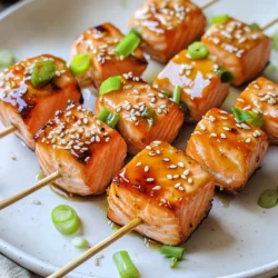 Für die köstlichen Honig Knoblauch Lachs-Spieße brauchen Sie: - 450 g frisches Lachsfilet, in 2,5 cm große Würfel geschnitten - 3 Esslöffel Honig - 3 Knoblauchzehen, fein gehackt - 2 Esslöffel Sojasauce (geringer Natriumgehalt, falls gewünscht) - 1 Esslöffel frischer Ingwer, gerieben - 1 Esslöffel Olivenöl - 1 Teelöffel Sesamöl - Salz und Pfeffer nach Geschmack - 1 Esslöffel Sesamsamen (zum Garnieren) - 1 Frühlingszwiebel, dünn geschnitten (zum Garnieren) - Spieße (bei Verwendung von Holzspießen in Wasser eingeweicht) Frischer Lachs ist der Schlüssel zu diesen Spießen. Achten Sie auf die Farbe. Der Lachs sollte leuchtend orange sein. Der Fisch muss fest und glänzend sein. Er sollte nicht unangenehm riechen. Kaufen Sie ihn am besten beim Fischhändler. Fragen Sie dort nach dem frischesten Stück. Wenn Sie kein Lachsfilet mögen, können Sie auch andere Fische verwenden. Forelle oder Thunfisch sind gute Alternativen. Für eine vegetarische Option könnten Sie Tofu oder Gemüse verwenden. Zucchini, Paprika und Champignons passen gut. Experimentieren Sie mit verschiedenen Zutaten, um Ihren eigenen Geschmack zu finden. Um die Marinade zu machen, nimm eine große Schüssel. Füge 3 Esslöffel Honig, 3 fein gehackte Knoblauchzehen, 2 Esslöffel Sojasauce, 1 Esslöffel geriebenen Ingwer, 1 Esslöffel Olivenöl und 1 Teelöffel Sesamöl hinzu. Streue Salz und Pfeffer nach Geschmack hinein. Rühre alles gut um, bis es gleichmäßig vermischt ist. Die Marinade wird die Basis für den Geschmack der Spieße. Schneide 450 g frisches Lachsfilet in 2,5 cm große Würfel. Gib die Lachs-Würfel in die Schüssel mit der Marinade. Rühre vorsichtig, damit jeder Würfel gut bedeckt ist. Decke die Schüssel mit Frischhaltefolie ab. Lass den Lachs 15 bis 20 Minuten marinieren. So nimmt er die Aromen gut auf und wird besonders lecker. Nimm die marinierten Lachs-Würfel und stecke sie auf die Spieße. Wenn du Holzspieße verwendest, weiche sie vorher in Wasser ein. Achte darauf, dass zwischen den Würfeln genug Platz bleibt. So garen sie gleichmäßig und werden zart. Dies ist ein wichtiger Schritt für die perfekte Textur. Heize die Luftfritteuse auf 200°C vor. Lege die Spieße in den Korb, aber überfülle ihn nicht. Gare die Spieße für 8 bis 10 Minuten. Wende sie zur Hälfte der Garzeit. Der Lachs ist fertig, wenn er sich leicht mit einer Gabel zerteilen lässt. Nimm die Spieße vorsichtig heraus. Garniere sie mit Sesamsamen und geschnittenen Frühlingszwiebeln. So sieht das Gericht noch schöner aus. Um die Aromen zu steigern, mariniere den Lachs gut. Lass ihn 15-20 Minuten ziehen. Diese Zeit hilft dem Lachs, die Süße des Honigs und die Schärfe des Knoblauchs aufzunehmen. Du kannst auch etwas Zitronensaft hinzufügen. Dies gibt dem Gericht eine frische Note. Für mehr Tiefe kannst du frische Kräuter wie Koriander oder Petersilie verwenden. Die ideale Garzeit für die Lachs-Spieße liegt bei 8-10 Minuten in der Luftfritteuse. Achte darauf, die Spieße bei der Hälfte der Garzeit zu wenden. So wird der Lachs gleichmäßig gegart. Wenn er sich leicht mit einer Gabel zerteilen lässt, ist er perfekt. Jedes Stück sollte zart und saftig sein. Wähle eine gute Luftfritteuse mit einer Temperaturkontrolle. Modelle mit einer Kapazität von 4-5 Litern sind ideal. Diese Größe bietet Platz für mehrere Spieße. Verwende Holzspieße, die du vorher in Wasser einweichst. Das verhindert, dass sie verbrennen. Es ist auch hilfreich, ein gutes Schneidebrett und eine Schüssel für die Marinade zu haben. {{image_4}} Du kannst die Lachs-Spieße aufpeppen, indem du Gemüse hinzufügst. Ich empfehle Paprika, Zucchini und Champignons. Diese Gemüsesorten ergänzen den Lachs hervorragend. Schneide sie in Stücke, die etwa gleich groß sind wie die Lachswürfel. So garen sie gleichmäßig. Stecke sie einfach abwechselnd auf die Spieße. Die Farben sehen toll aus und der Geschmack wird noch besser! Wenn du etwas Abwechslung suchst, probiere andere Marinaden. Eine Zitronen-Kräuter-Marinade bringt frische Aromen. Mische Olivenöl, Zitronensaft, Knoblauch und frische Kräuter. Du kannst auch eine Teriyaki-Marinade machen, indem du Sojasauce, Honig und Reisessig verwendest. Sei kreativ! Jede Marinade gibt den Spießen einen neuen Twist. Die Verwendung von verschiedenen Gewürzen kann den Geschmack stark beeinflussen. Füge etwas Paprika oder Cayennepfeffer für Schärfe hinzu. Oder verwende frische Kräuter wie Dill oder Petersilie für einen frischen Geschmack. Du kannst die Gewürze an deinen Geschmack anpassen. Experimentiere damit und finde deine Lieblingskombination! Um die Reste deiner Honig Knoblauch Lachs-Spieße richtig zu lagern, lege sie in einen luftdichten Behälter. So bleiben sie frisch. Stelle sicher, dass die Spieße abgekühlt sind, bevor du sie lagerst. Das hilft, die Feuchtigkeit zu bewahren. Wenn du die Lachs-Spieße wieder aufwärmen möchtest, kannst du sie einfach in der Luftfritteuse auf 180°C erhitzen. Das dauert etwa 5 Minuten. Alternativ kannst du sie auch in der Mikrowelle aufwärmen, aber die Luftfritteuse gibt dir mehr Knusprigkeit zurück. Achte darauf, sie nicht zu lange zu erhitzen, damit sie nicht trocken werden. Im Kühlschrank halten die Lachs-Spieße etwa 2 bis 3 Tage. Du kannst sie auch einfrieren, wenn du sie länger aufbewahren möchtest. Im Gefrierfach bleiben sie bis zu 3 Monate frisch. Stelle sicher, dass sie gut verpackt sind, um Frostbrand zu vermeiden. Wenn du bereit bist, sie zu essen, taue sie im Kühlschrank auf, bevor du sie erhitzt. Du kannst die Lachs-Spieße bis zu 20 Minuten marinieren. So ziehen die Aromen gut ein. Ich empfehle, die Marinierzeit nicht zu überschreiten. Zu langes Marinieren kann den Lachs weich machen. Ja, du kannst gefrorenen Lachs verwenden. Achte darauf, ihn vorher gut aufzutauen. Am besten taust du ihn über Nacht im Kühlschrank auf. Das hilft, die Textur zu bewahren. Ein frischer Salat passt perfekt zu Lachs-Spießen. Auch Reis oder Quinoa sind tolle Optionen. Du kannst die Spieße mit Gemüse servieren, um eine ausgewogene Mahlzeit zu erhalten. Der Lachs ist durchgegart, wenn er sich leicht mit einer Gabel zerteilen lässt. Er sollte eine hellrosa Farbe haben. Vermeide es, ihn zu lange zu garen, da er sonst trocken wird. In diesem Blogbeitrag habe ich alles über honig-knoblauch-lachs-spieße erklärt. Wir haben die besten Zutaten und Tipps für die Zubereitung besprochen. Ich habe dir gezeigt, wie du die Spieße marinierst und in der Luftfritteuse garst. Variationen und Lagerungstipps voller nützlicher Informationen standen ebenfalls im Fokus. Denke daran: Lachs kann viele Geschmäcker annehmen. Probiere verschiedene Marinaden und Kräuter aus. So bleibt das Gericht spannend und lecker. Mit den richtigen Tipps wird jedes Grillfest ein Erfolg!